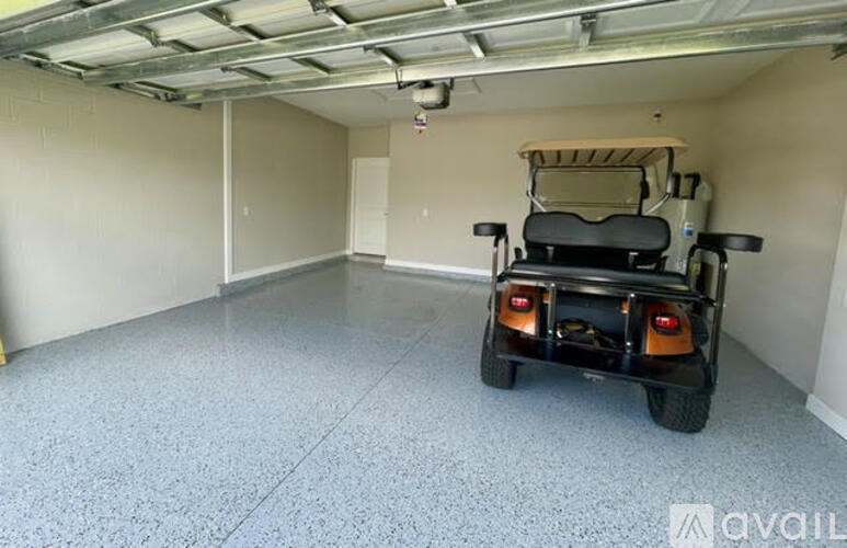 A room with a wheelchair-accessible vehicle inside.