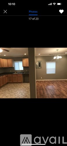A photo gallery app showing a photo of a kitchen.