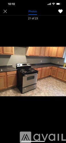 A black stove top oven sitting on a kitchen counter.