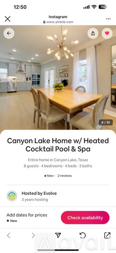 A dining room with a wooden table and chairs is shown.