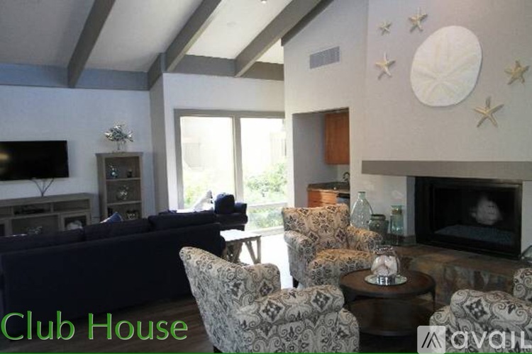 A living room with a fireplace and a couch.