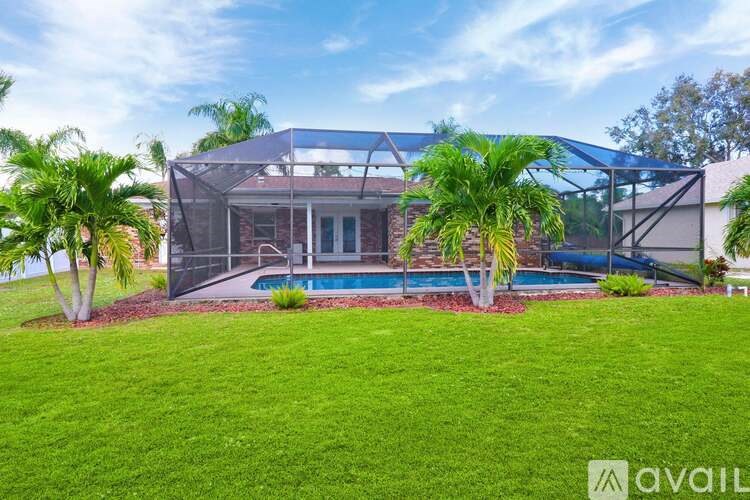 A house with a pool and a glass roof is for sale.