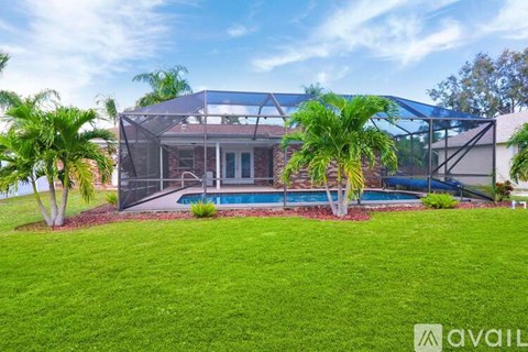 A house with a pool and a glass roof is for sale.