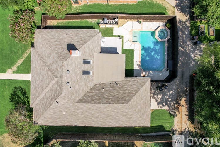 A house with a pool in the backyard.