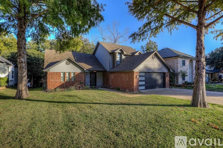 A house with a lawn in front of it is for sale.