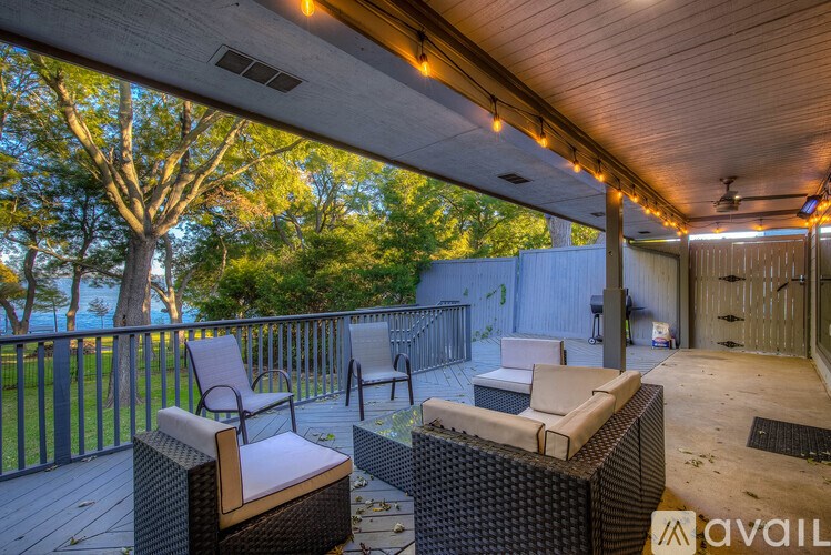 A patio with a table and chairs is available for rent.