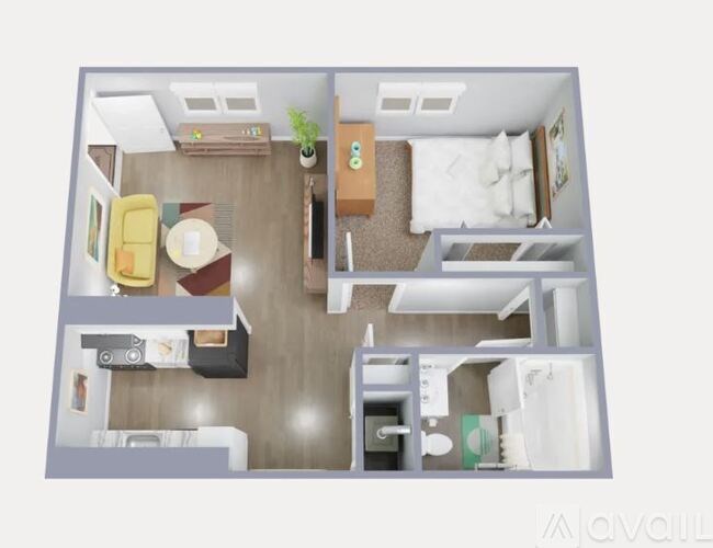 A living room with a couch, a chair, and a potted plant.