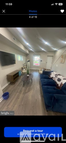 A living room with a couch and a coffee table.