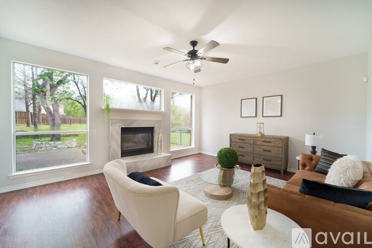A living room with a fireplace and a couch.