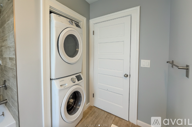 A washer and dryer in a small laundry room.