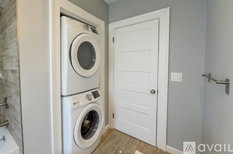 A washer and dryer in a small laundry room.