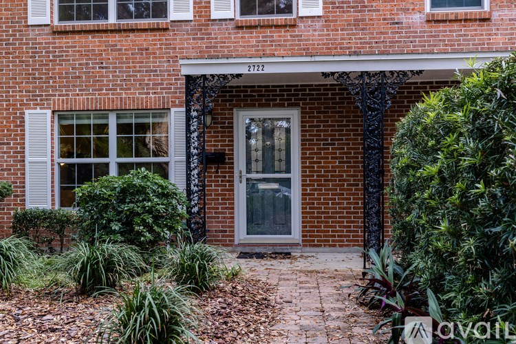 A brick building with the number 21722 on the top.