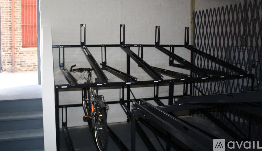A bicycle is parked on a bike rack.