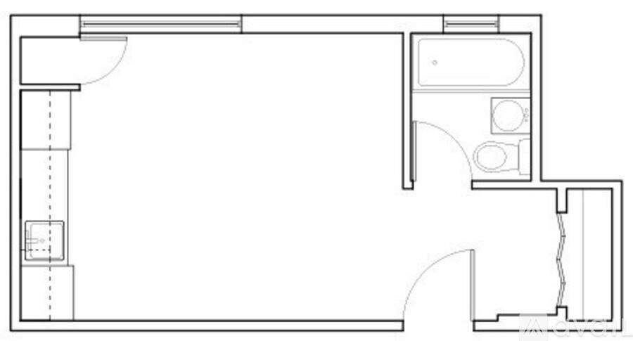 A floor plan of a room with a kitchen area and a separate bathroom.