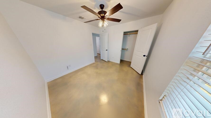 A bathroom with a sink and mirror.