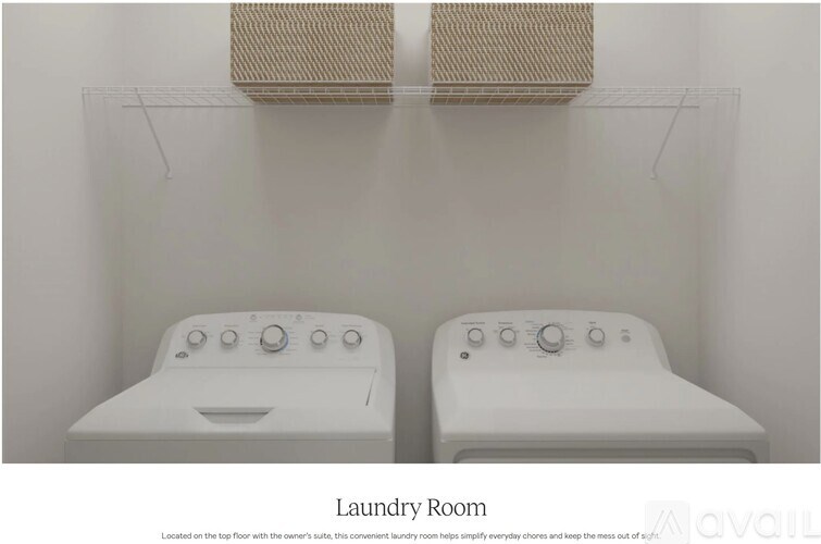 A laundry room with two washing machines.