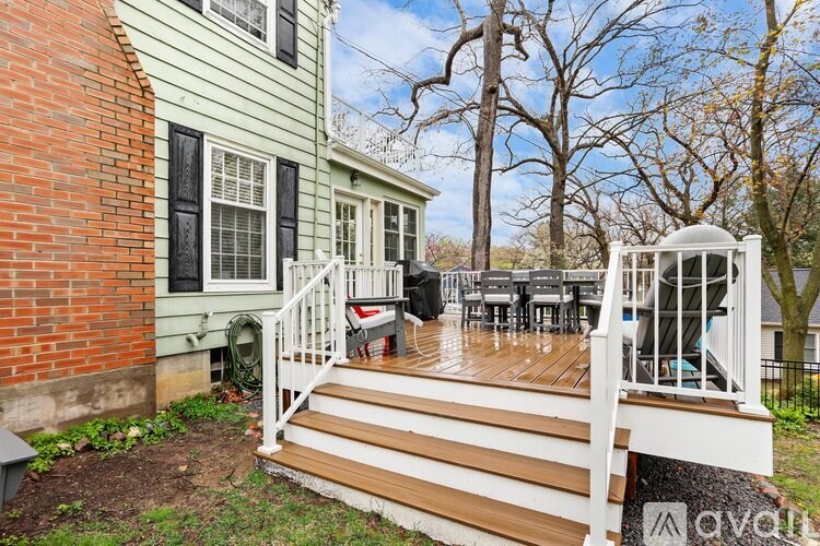 A house with a deck and patio area.