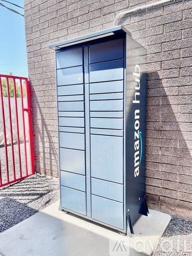 A tall, grey, metal storage unit with the word "hub" written on it.