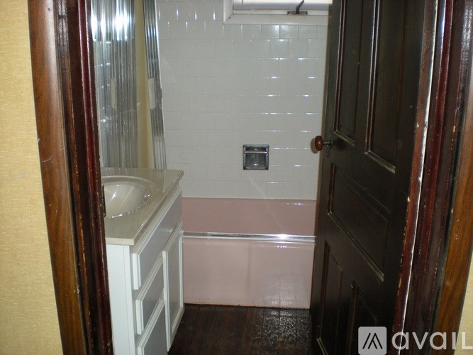 A bathroom with a sink and a bathtub.