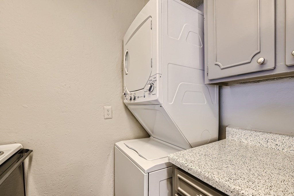 A white dishwasher is installed in a kitchen.