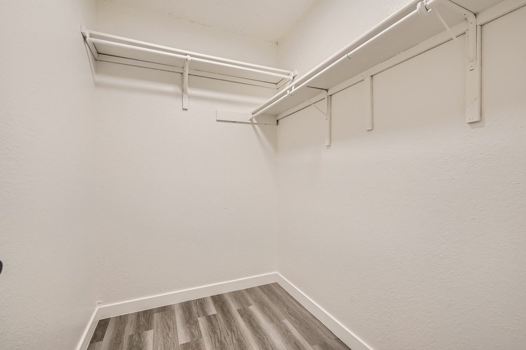 A white wall with a white pipe on it.