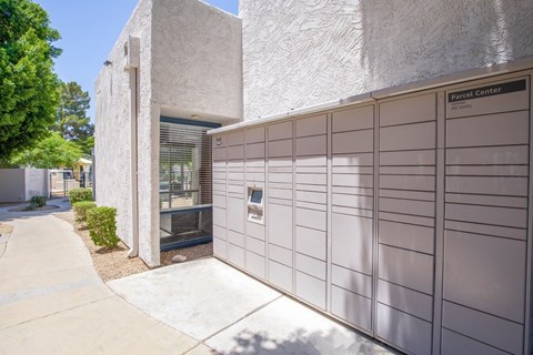 A modern building with a Parcel Center sign on the wall.