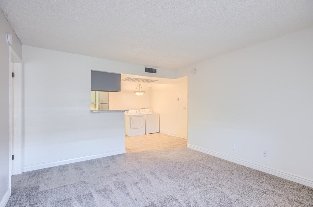 A laundry room with a washer and dryer.
