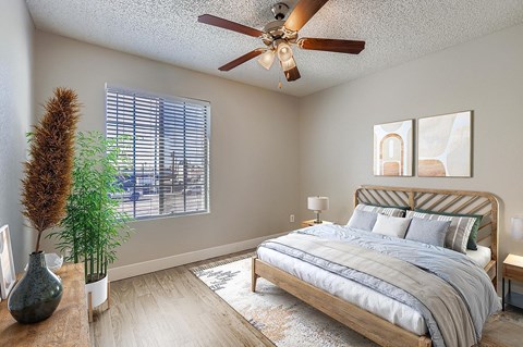 A bathroom with a white sink and a white toilet.