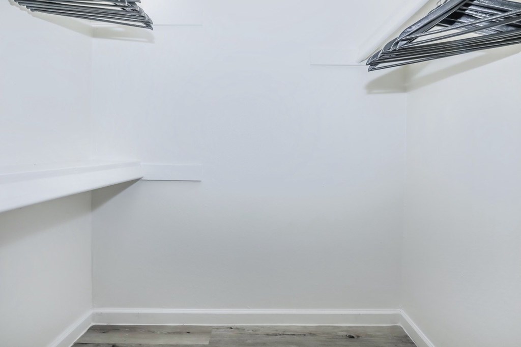 A room with a white ceiling and a white floor.
