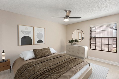 A bedroom with a bed, nightstand, and two wall art pieces.