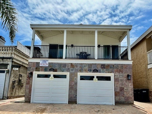 A two-car garage is attached to a house.