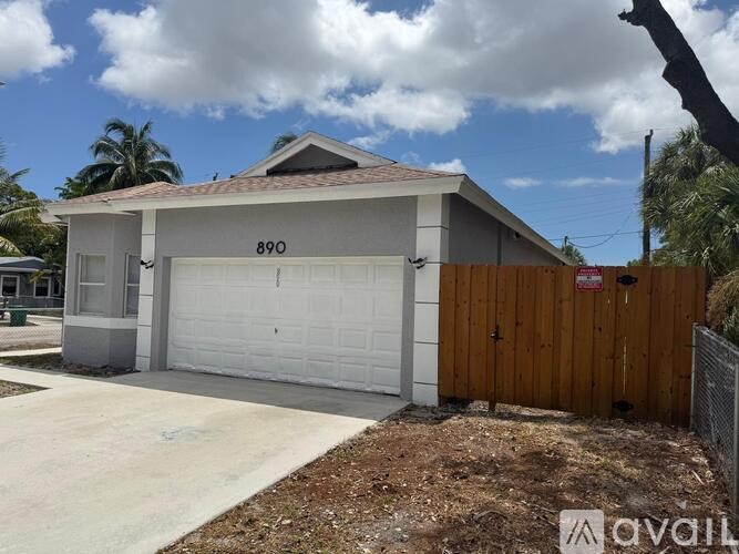 A two-car garage with the number 890 on the side.