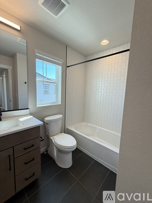 A white door with a handle and a sign that says "available" on the bottom right.