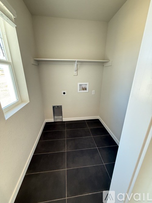 A display of various countertop samples and accessories for a laundry room.