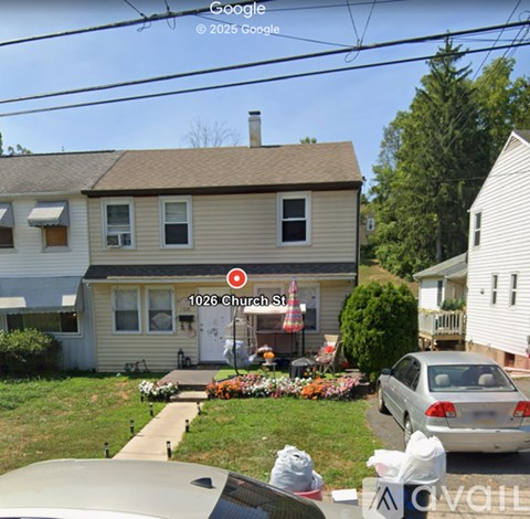 A house with the number 1026 on it is located on Church Street.