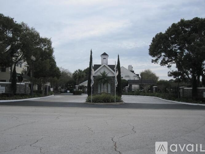 A large open area with a building in the background and a sign that says "available".