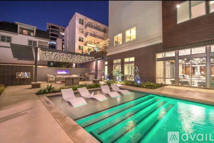 A pool with a lit up sign that says "available" in the background.