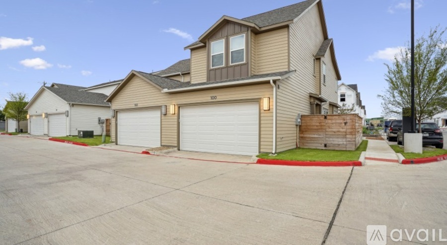 A house with a garage is available for sale.