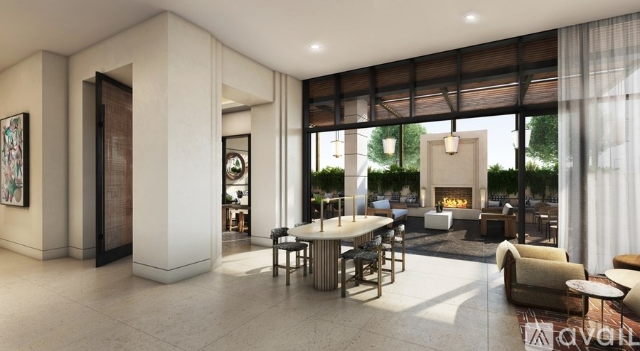 A modern living room with a fireplace and a dining table.