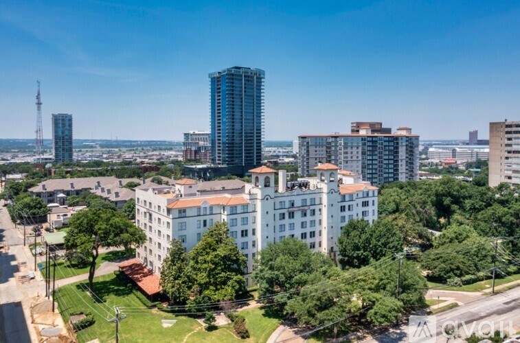 A cityscape with a mix of residential and commercial buildings.