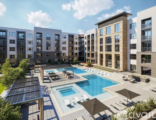 A large swimming pool surrounded by lounge chairs and umbrellas is the centerpiece of a luxurious apartment complex.