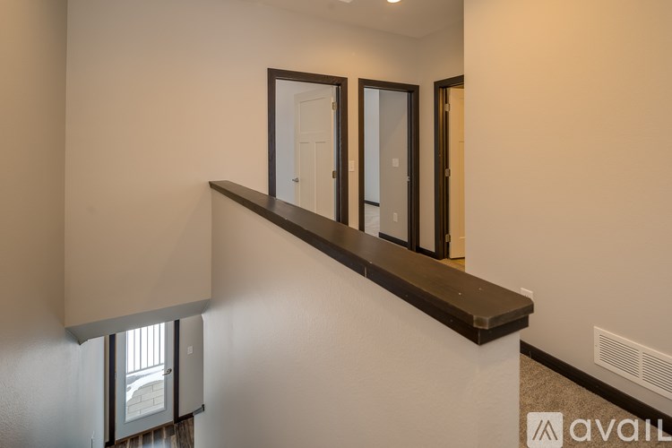 A wall with a window and a mirror on it.