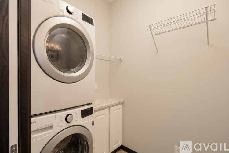 A laundry room with a washer and dryer.