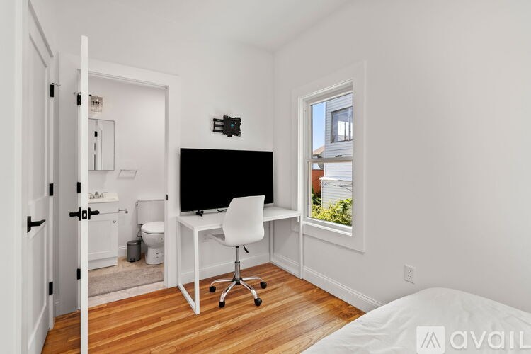 A patio with a table and chairs is shown.