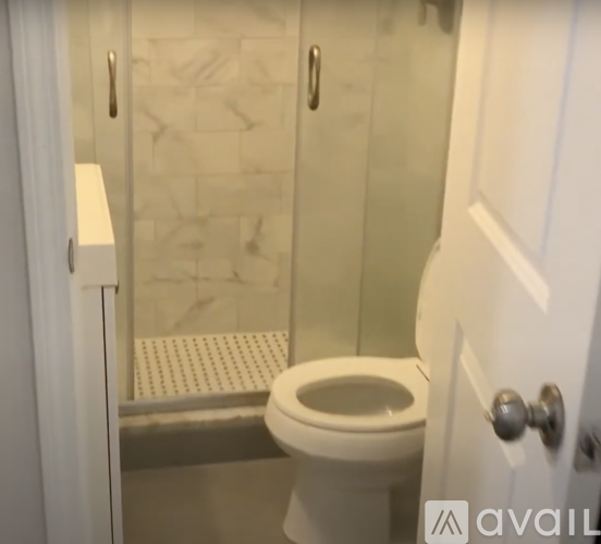 A room with a door and a window.