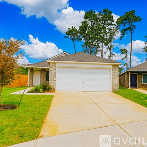 A house with a garage is for sale.