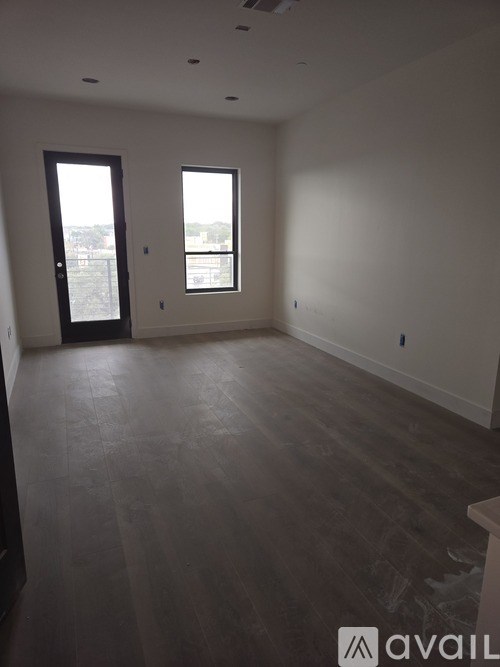 A room with a door and a window.