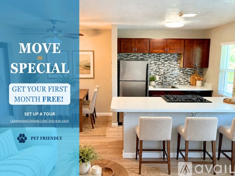 A kitchen with a refrigerator, cabinets, and a countertop is on sale for the first month free.