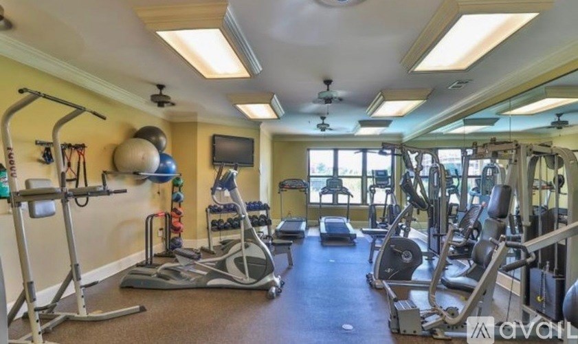 A well-equipped gym with various exercise machines and equipment.