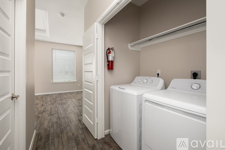A laundry room with a washer and dryer.